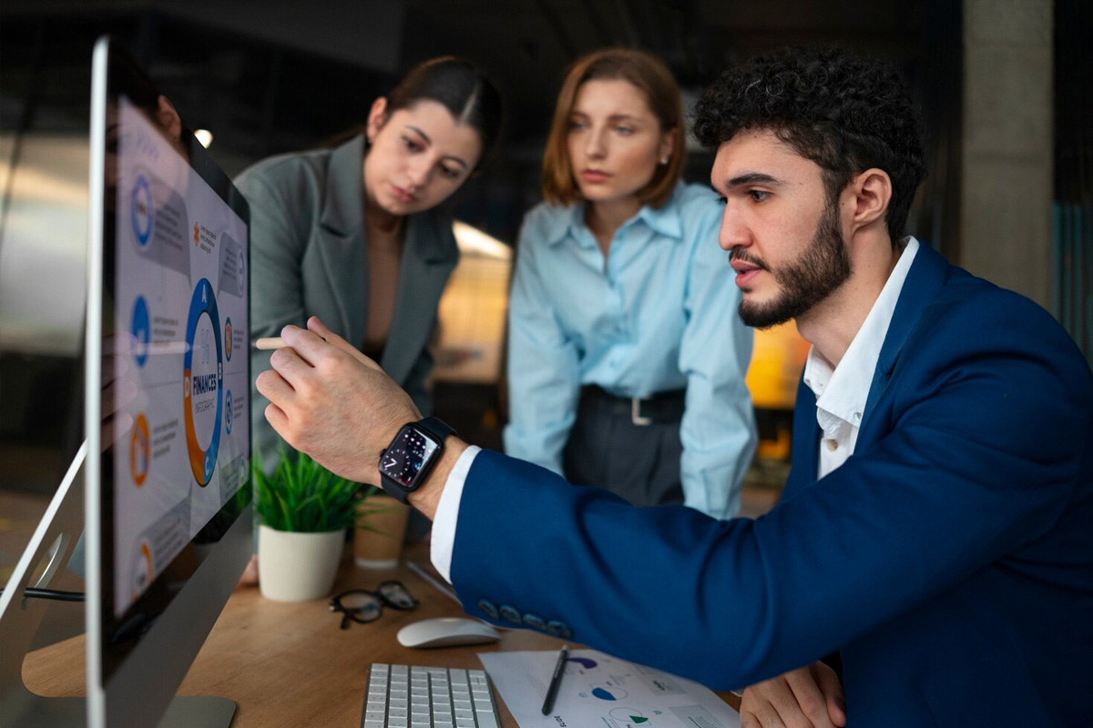 Colleagues working in an open-plan office
