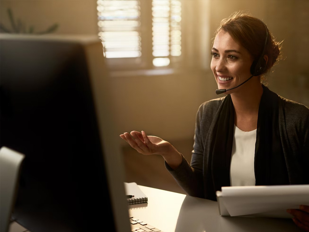 Support specialist on a video call with a customer